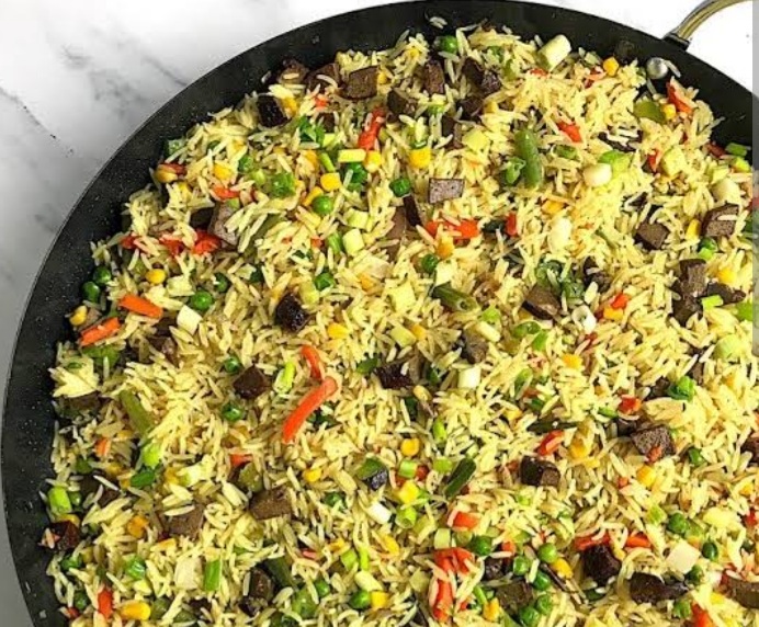 Relish of Nigerian fried rice and Turkish flat bread