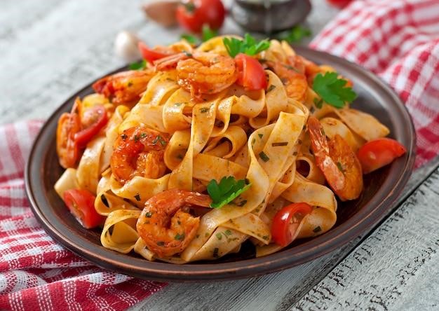 Spicy shrimp pasta and spagh with vegetables