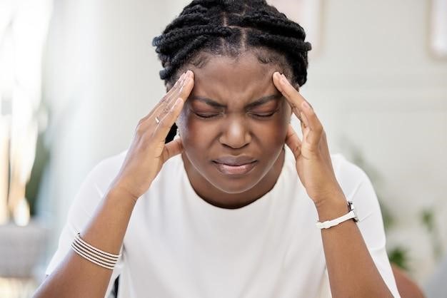 When should headache become a concern for a woman?