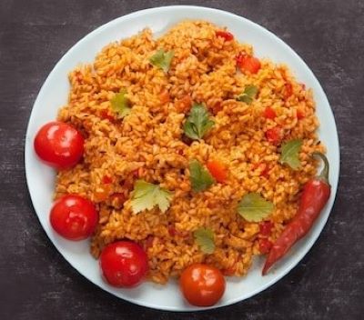 Try Cameroon jollof rice or egusi pudding