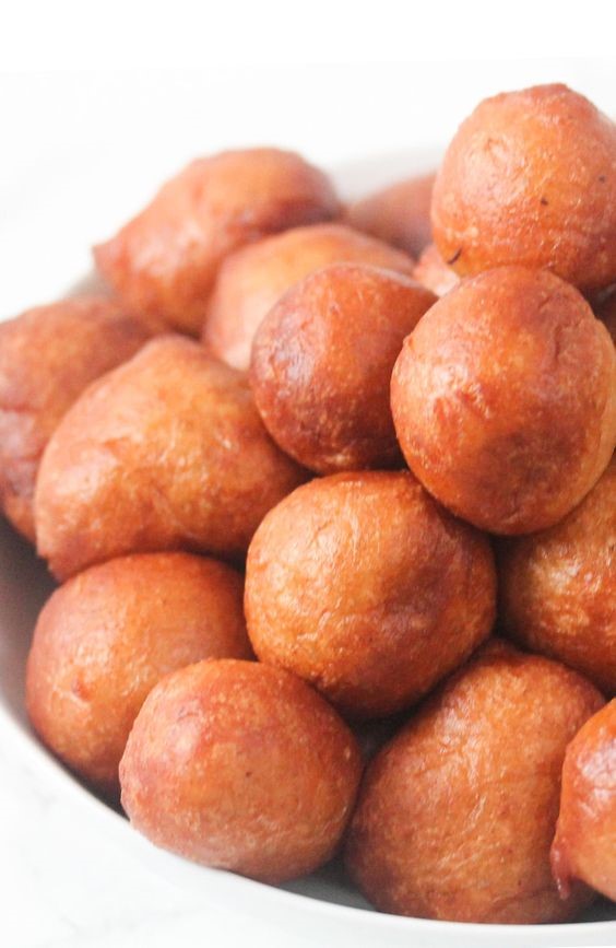 Snack on peppered puff-puff and grilled plantain!