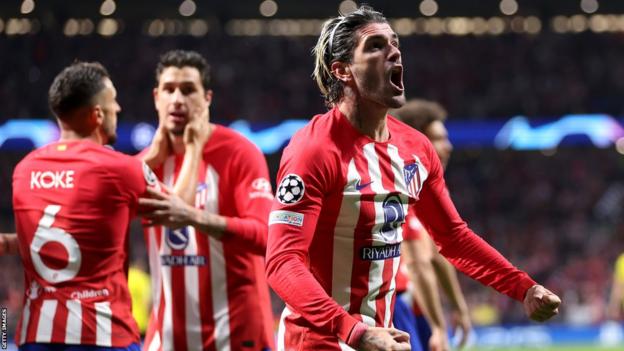Atletico survive late Dortmund pressure to hold on for 2-1 win