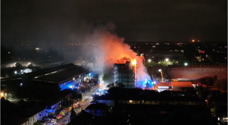 Emergency declared and two hospitalised as fire engulfs east London building