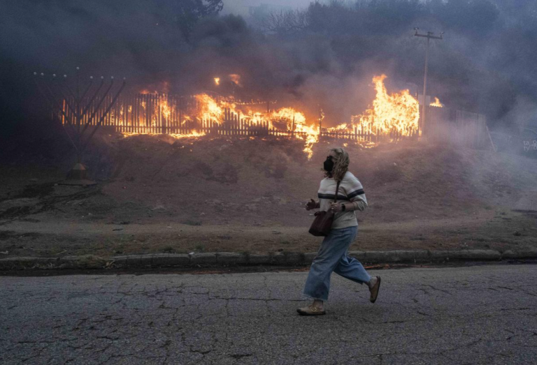 2 die as Los Angeles wildfires spread across 22,000 acres