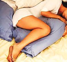 Sleeping with pillows between your legs